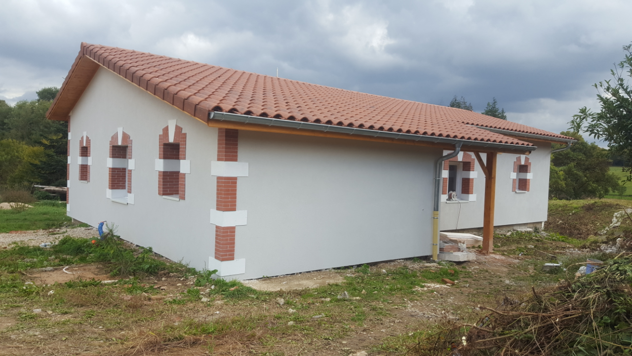 photo-facade-la-chapelle-du-chatelard-01240-apres-isolation-thermique-exterieure